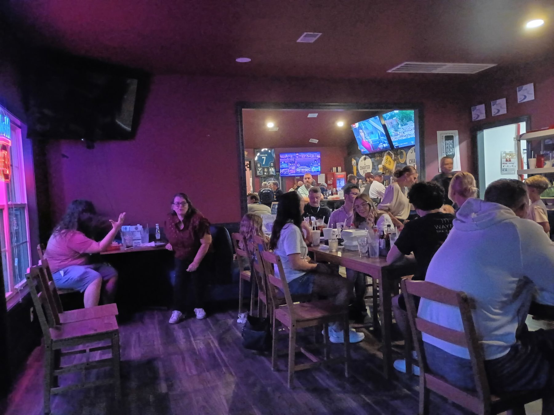 Guest celebrating during a Four Dogs event