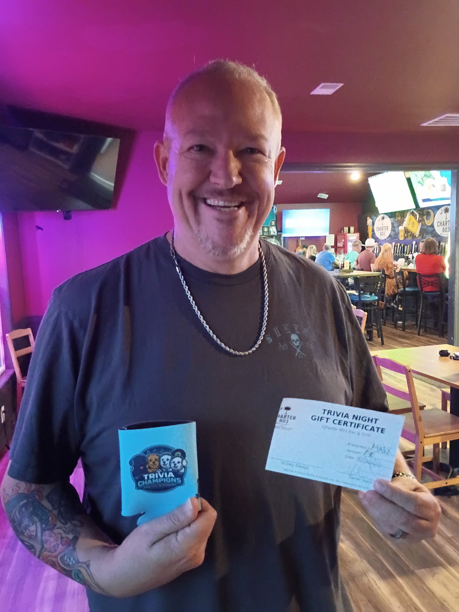 Music bingo guest celebrating at Charter 803