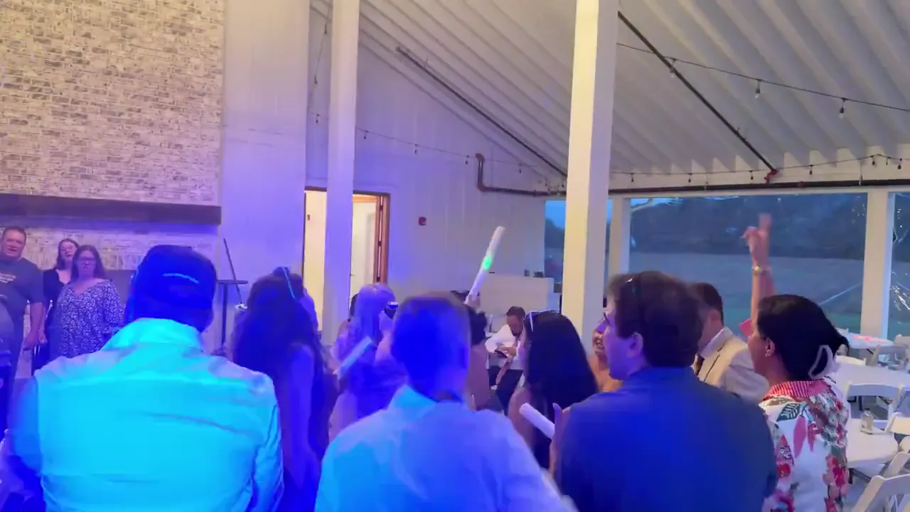 Guests gathered at a Four Dogs private event