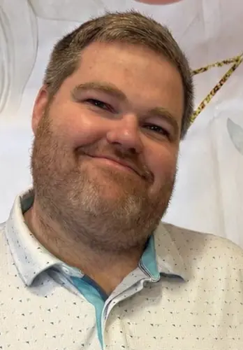 Joey Elledge, owner and host of Four Dogs Entertainment